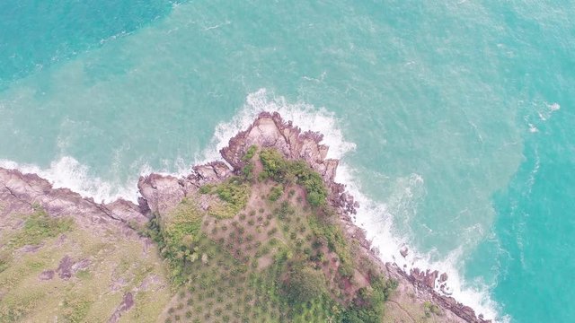 4k aerial view drone shot of beautiful mountain and tropical sea in summer season Location at Laem Krating Phuket Thailand