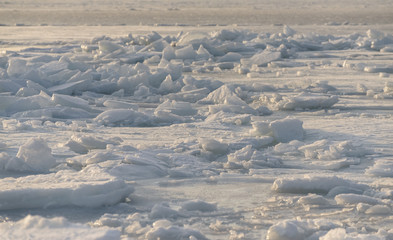 Frozen sea view on sunny day.