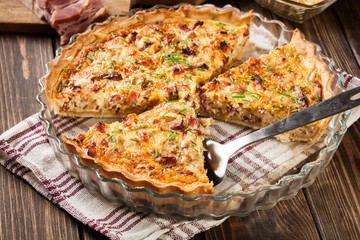 Pieces of quiche lorraine with bacon and cheese