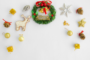 Christmas and New Year background. Christmas wreath with decorations on white background. Creative flat lay, border and copy space