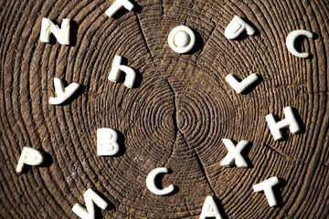 cookies alphabet wooden background