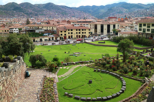 Garden Outside Coricancha Temple in Cusco of Peru, with the Symbol of Inca Mythology of Condor, Puma and Snake