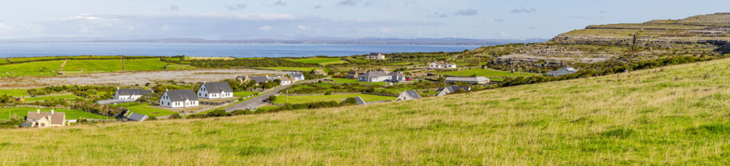 Fototapeta na wymiar Panorama of Farms in Fanore village with Galway bay in background