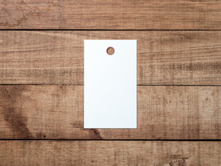 White tag label Mockup on wooden table , show your price