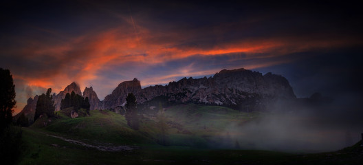 Panoramic view of famous Dolomites mountain peaks during evening light at sunset