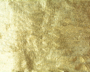 Fototapeta na wymiar Shiny hot yellow gold foil golden color glitter decorative texture paper: Bright brilliant festive metallic textured empty wallpaper backdrop: Tin metal material for holiday craft design decoration