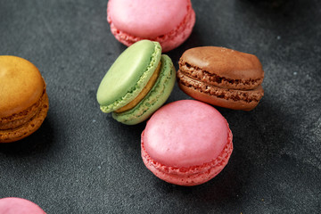 Sweet colorful macarons dessert, almond cake, cookies. selected focus.