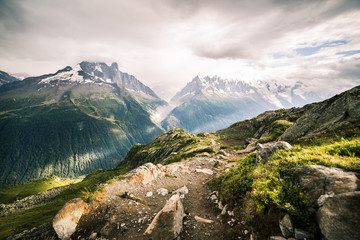 Fototapeta na wymiar Mont-Blanc Snowy Peaks and Glacier in Cloudy Weather.