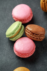 Sweet colorful macarons dessert, almond cake, cookies. selected focus.