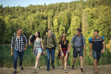 a group of friends showing great emotions of amazement and excitement after the sightseeing. full...
