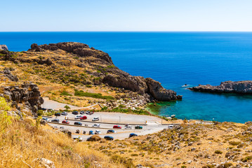 Sea view and parking for cars in the village of Lindos on the island of Rhodes