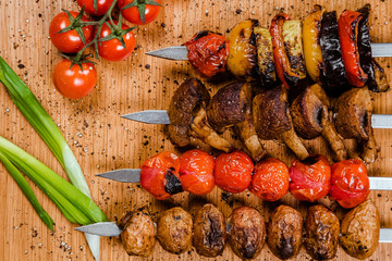 shish kebab assortment. a variety of meat. On the wooden table.