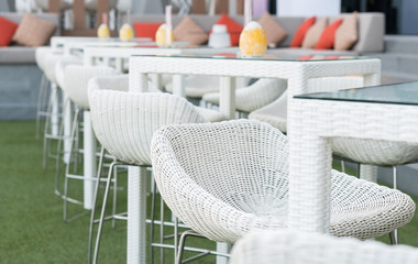 Fototapeta na wymiar Outdoor bar seats row in the luxury hotel terrace