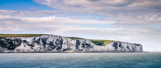 View on the white cliffs of Dover coast from the sea ferry - England
