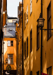 Fototapeta na wymiar Stockholms building facade on old narrow street. Sweden. 