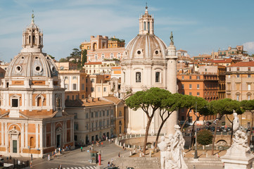 Fototapeta na wymiar Trajan's Column and Santa Maria di Loreto Church in Rome, Italy