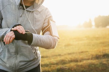 Watch for sports with smartwatch. Jogging training for marathon.