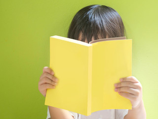 little child reading book