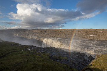 waterfall in iceland in the mountain