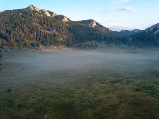 Obraz premium Early morning mist at Veliki Lubenovac, Northern Velebit, Croatia