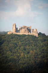 Ruin of Brekov castle on top of the hill in morning light, Slovakia
