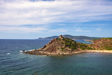 Fototapeta premium Alghero, Sardinia Italy - Panoramic view of the Cala Porticciolo gulf with Torre del Porticciolo tower in the Porto Conte Regional Park