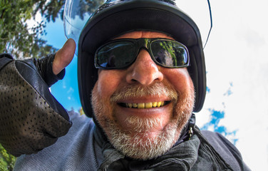 Portrait of a crazy motorcyclist