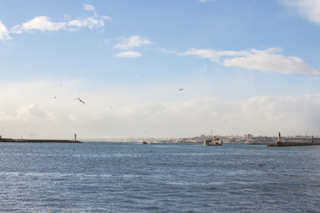 Ferry leaving the port of Kadikoy district, Asian side of the city, heading to the European side, Ayasofya mosque can be seen in the background.