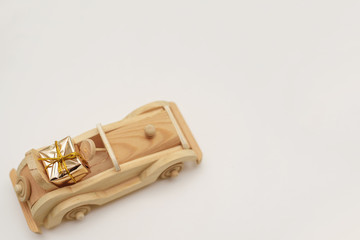 wooden car lucky gift for Christmas. Copy space. 