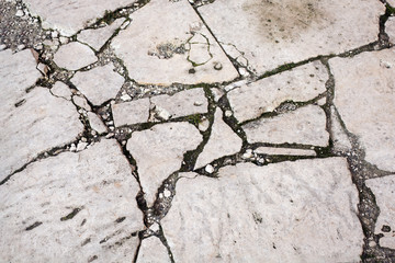 Obraz premium old broken stone road, background, texture