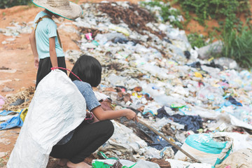 Children find garbage for sale, lifestyles of the poor and child labor concept