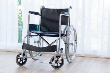 Wheelchairs waiting for services on hospital room with sun light near window to creative for design and decoration on background.Copy space.