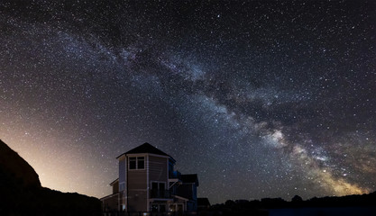Naklejka na ściany i meble Beautiful night sky astrophotography landscape image of MILKY WAY over still lake