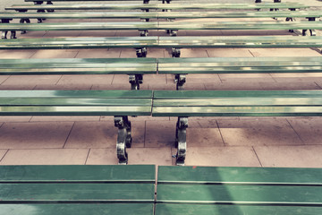 Obraz premium green benches in the park