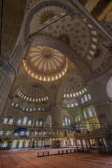 Fototapeta na wymiar Interior of Sultanahmet mosque (Blue mosque) in Istanbul, Turkey.