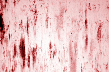 Grungy rusted metal surface in red tone.