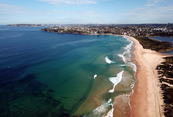 Bird view of Dee Why beach (Sydney, Australia) on a sunny but cold day in winter time. Manly and...