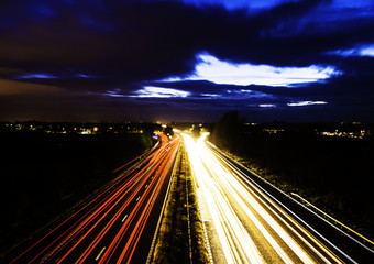 Motorway traffic night time in the UK, long exposure.