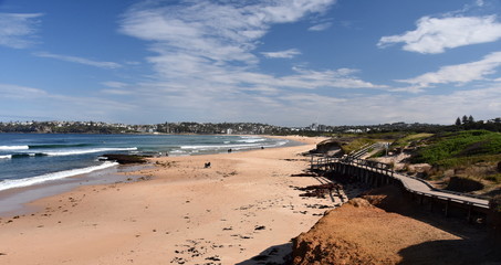 View of Dee Why beach (Sydney, Australia) on a sunny but cold day in winter time.