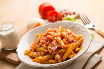 pasta with tomatoes sauce bacon and cream sauce
