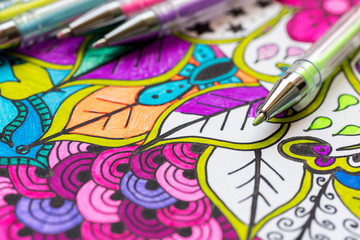 Adult coloring book, new stress relieving trend. Art therapy, mental health, creativity and...