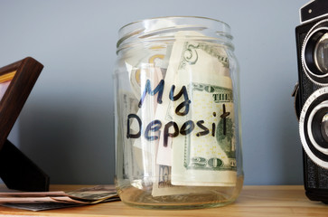 My deposit written on a jar with money.