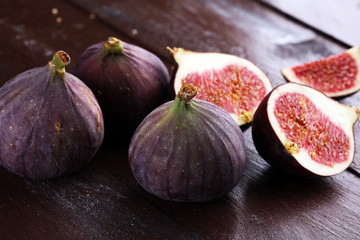 Fresh figs. Food Photo. whole and sliced figs on rustic background.