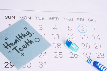 Calendar and toothbrush.