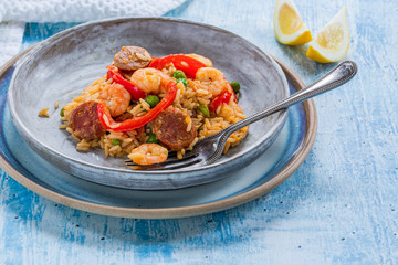 Spanish paella with prawns, chicken, chorizo and red pepper