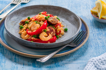 Spanish paella with prawns, chicken, chorizo and red pepper