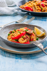 Spanish paella with prawns, chicken, chorizo and red pepper