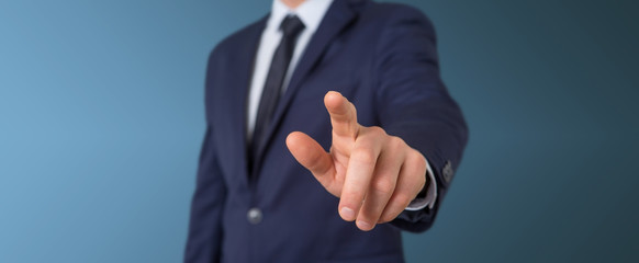Businessman pointing finger