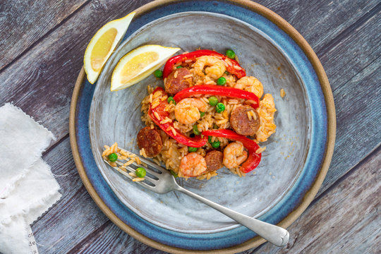 Spanish paella with prawns, chicken, chorizo and red pepper - top view
