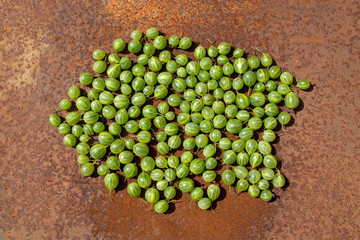 Cloud fresh gooseberry on rusty metal surface background